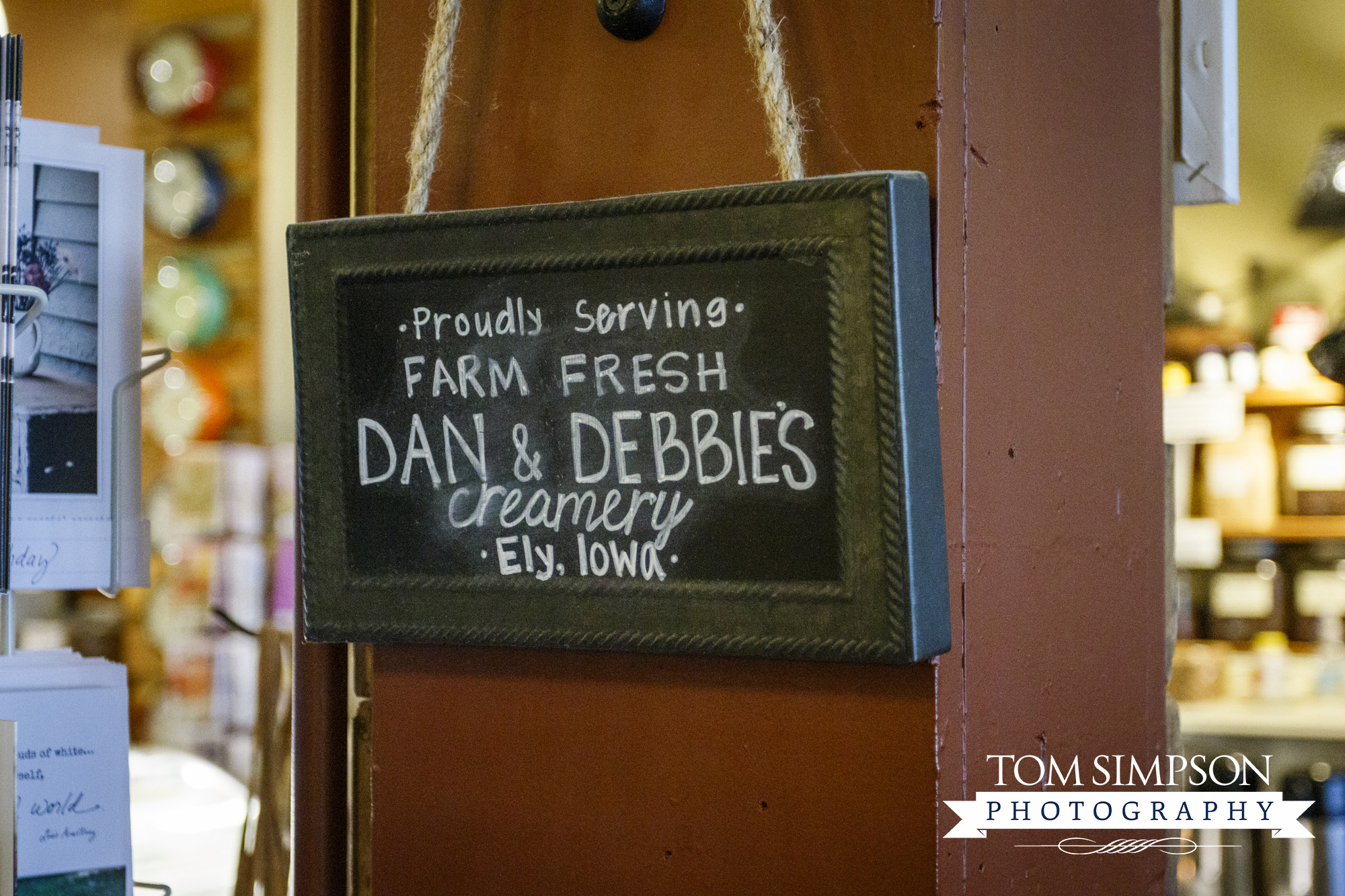 sign for dan and debbies creamery in ely iowa