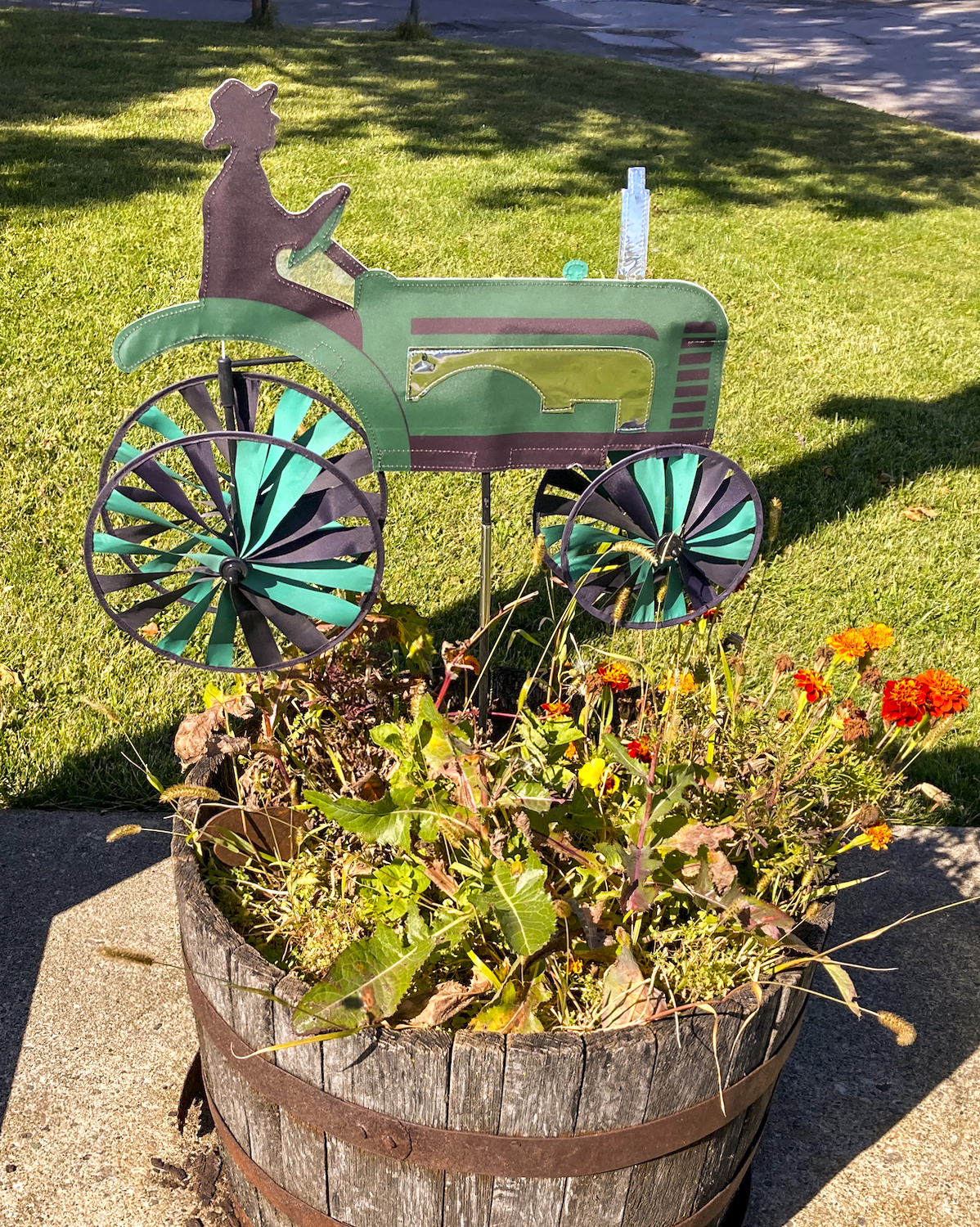 garden bling green tractor with whirlygig wheels