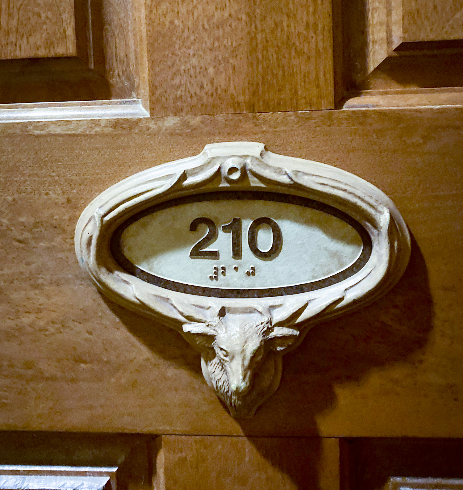 door sign on wyoming inn of jackson suite