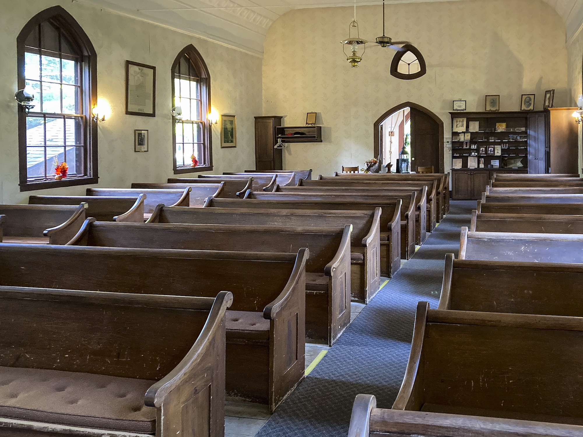 old wood pews inside the  historic building