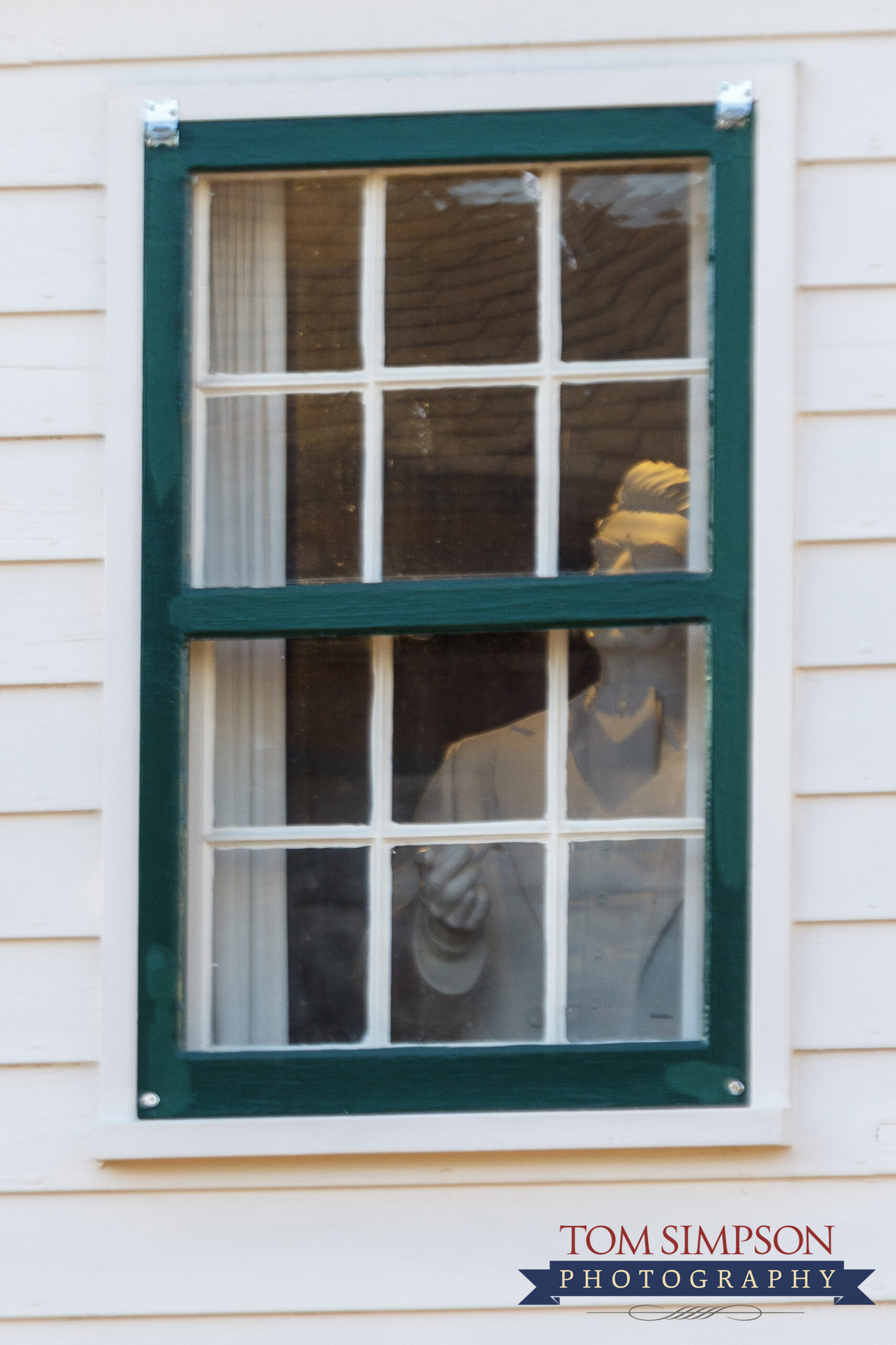 window showing statue