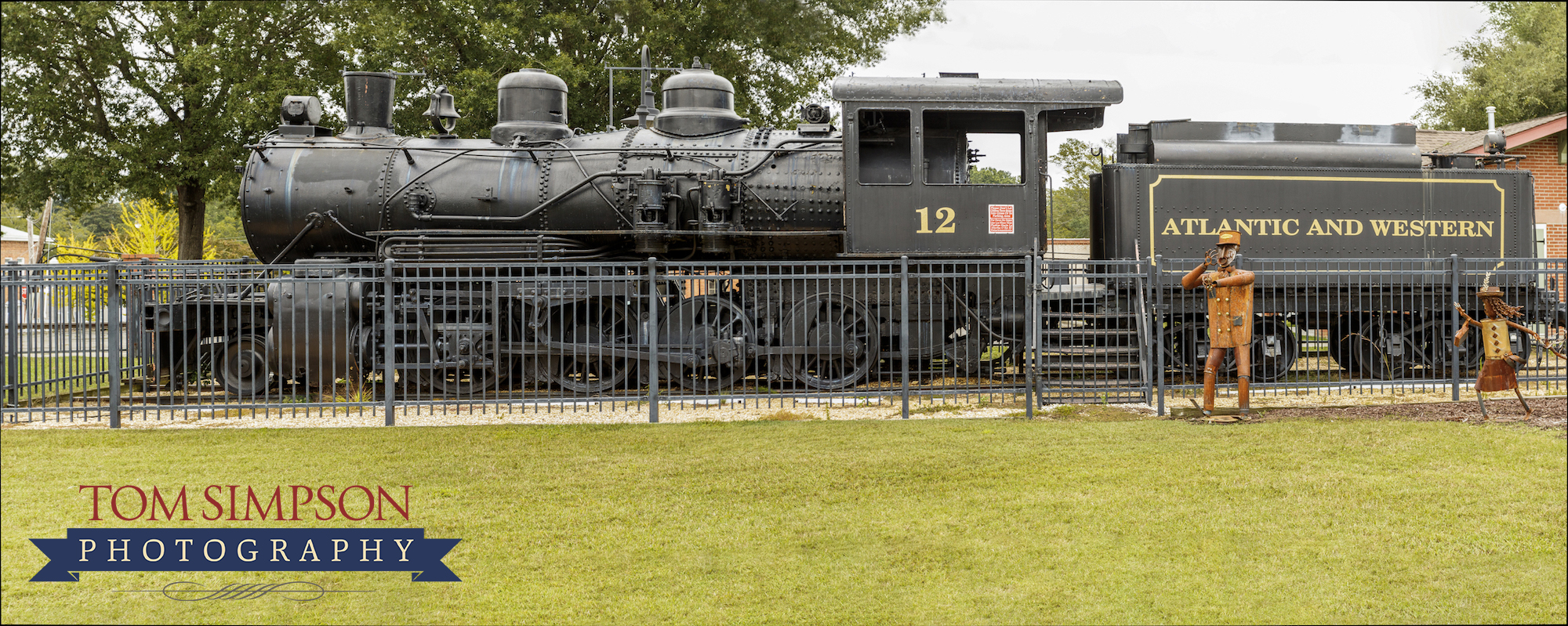 old depot has historic locomotive on display