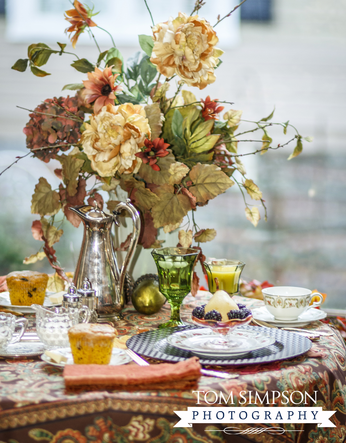 fall floral arrangement on breakfast table