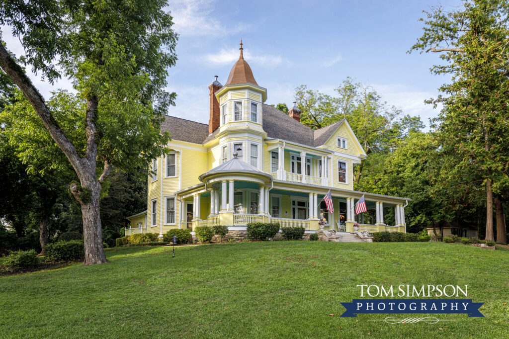 yellow historic victorian home