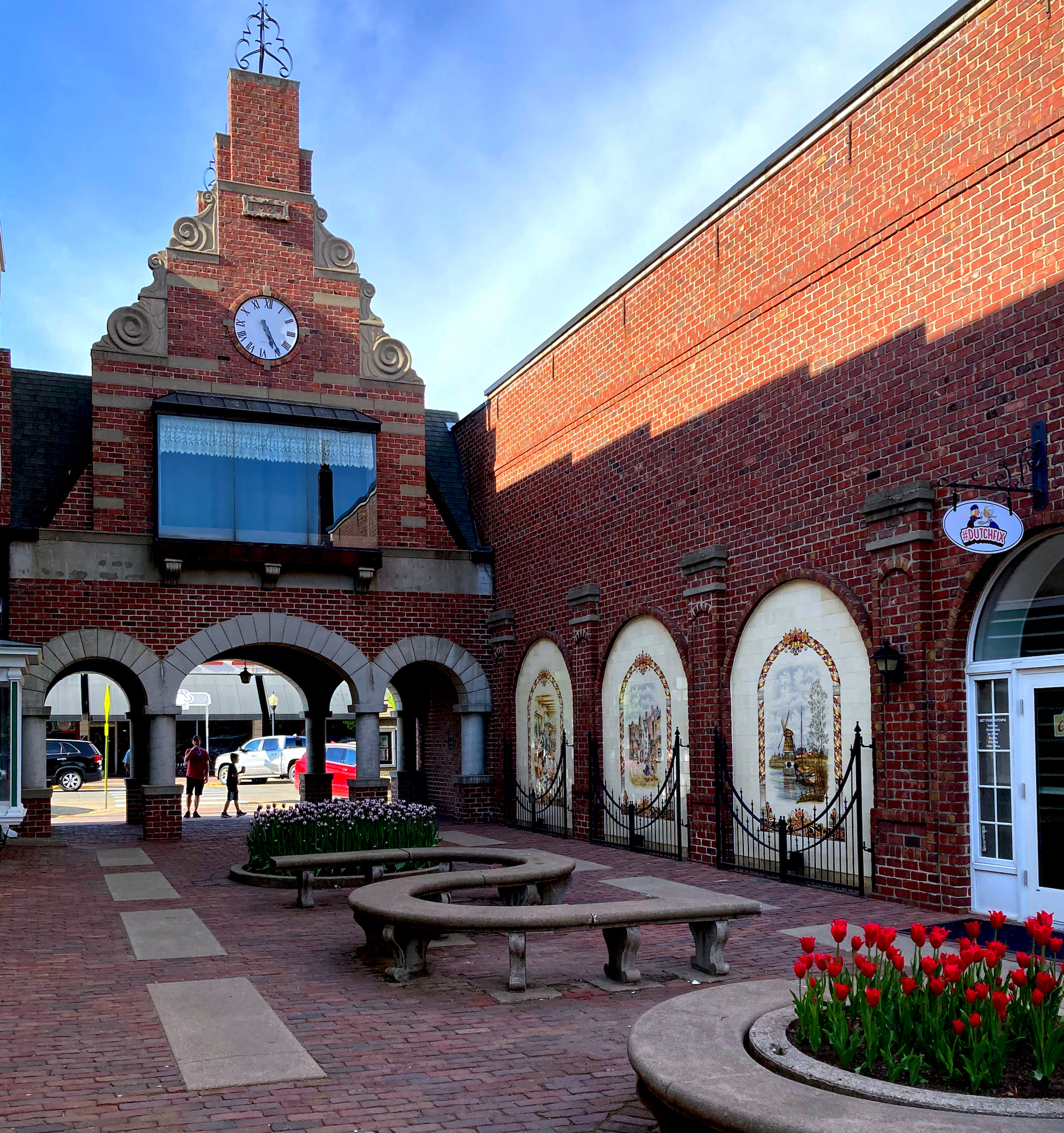 red brick buildings and arches