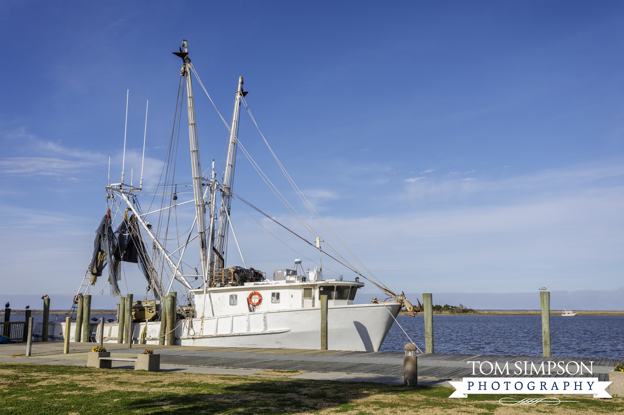 small town commercial fishing boat docked
